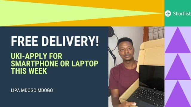 A man holding a laptop