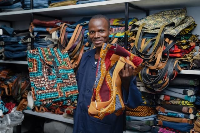Image of a man selling bags
