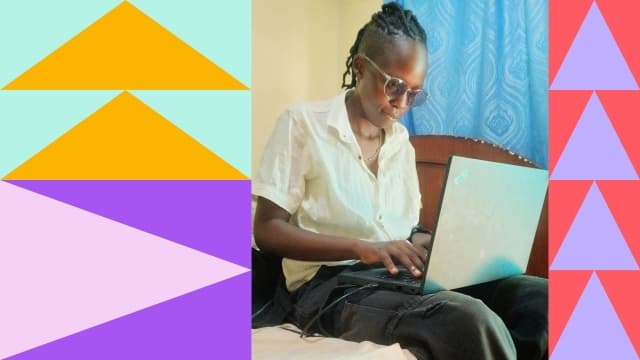 Visual of triangles alongside a lady using a laptop