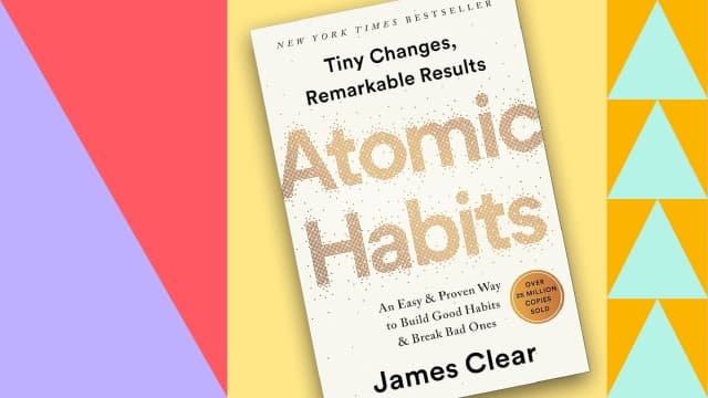 Visual of book with text written atomic habits